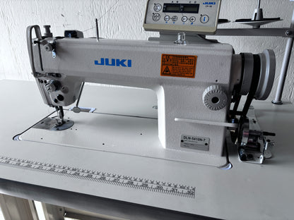 Pre-owned Juki DLN 5410N-7 needle feed lockstitch sewing machine