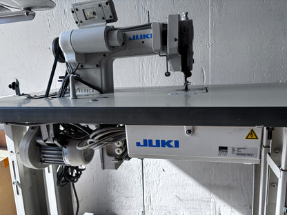 Pre-owned Juki DLN 5410N-7 needle feed lockstitch sewing machine