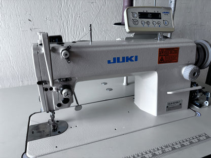 Pre-owned Juki DLN 5410N-7 needle feed lockstitch sewing machine