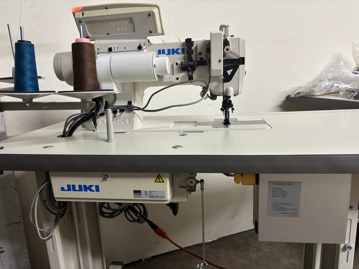 Pre-owned JUKI LH3568A-7 automatic double needle split bar sewing machine