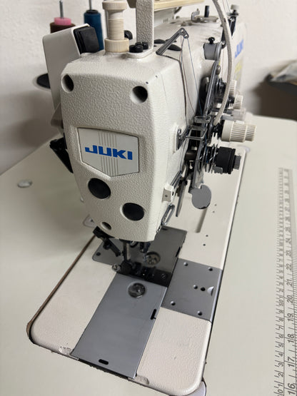 Pre-owned JUKI LH3568A-7 automatic double needle split bar sewing machine