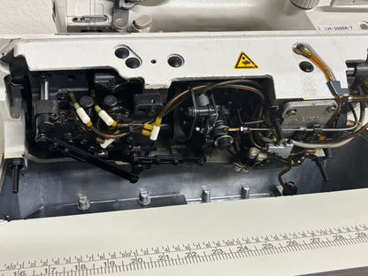 Pre-owned JUKI LH3568A-7 automatic double needle split bar sewing machine