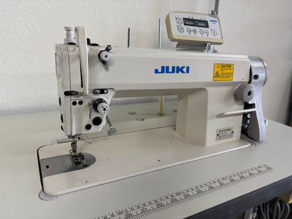 Pre-owned Juki DLN 5410N-7 needle feed lockstitch sewing machine